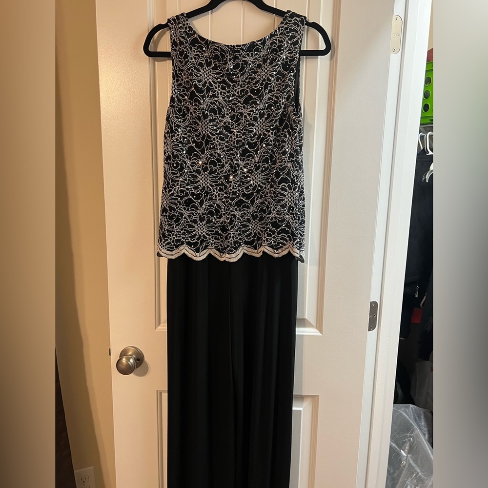 Black and Silver Sparkle Romper Size 6, worn 1 time